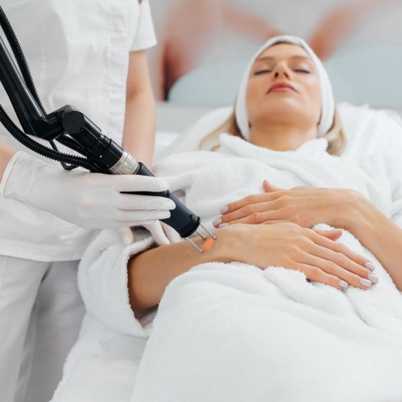 young-girl-gets-carbon-peeling-skin-her-hands-beauty-salon-laser-pulses-cleanse-skin-hardware-cosmetology-process-photothermolysis-warming-skin